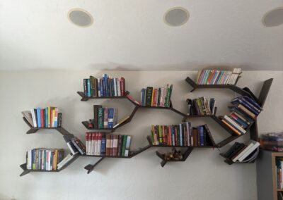 Custom Bookshelf made to look like a branch Grand Valley Repair in Grand Junction