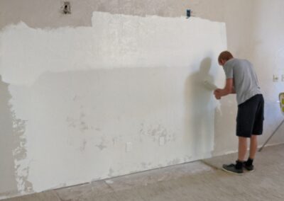 Fireplace removal with drywall patch and paint Grand Valley Repair in Grand Junction